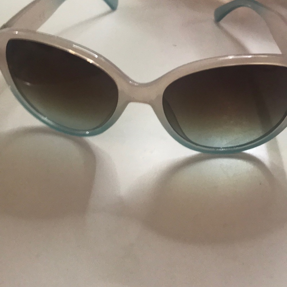 Aj sunglasses. The frames are a ombré color.